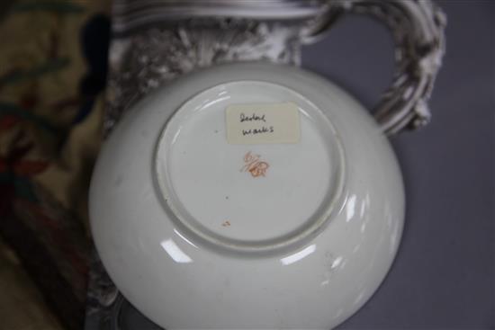 A collection of 19th century floral painted teaware and a French gilt decorated two handled vase